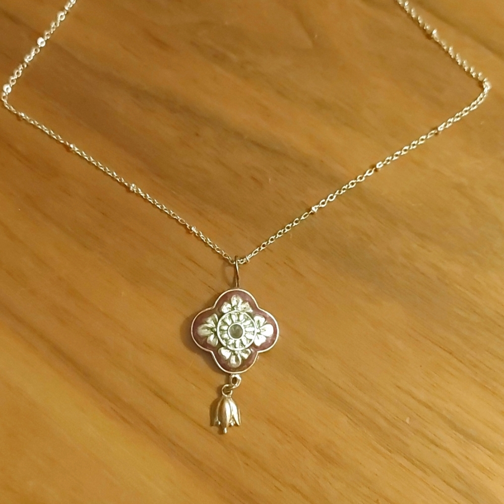 Enamel Purple floral Pendant on  18 inch Silver Plated chain.